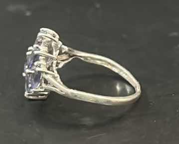 Photo 1 of STERLING SILVER RING WITH PURPLE STONES ESTIMATED SIZE 8