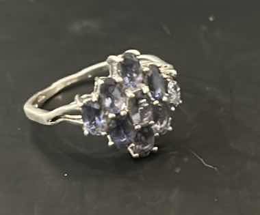 Photo 1 of STERLING SILVER RING WITH PURPLE STONES ESTIMATED SIZE 8