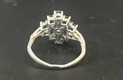 Photo 1 of STERLING SILVER RING WITH PURPLE STONES ESTIMATED SIZE 8