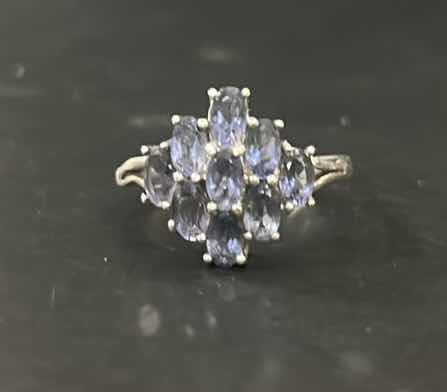 Photo 1 of STERLING SILVER RING WITH PURPLE STONES ESTIMATED SIZE 8