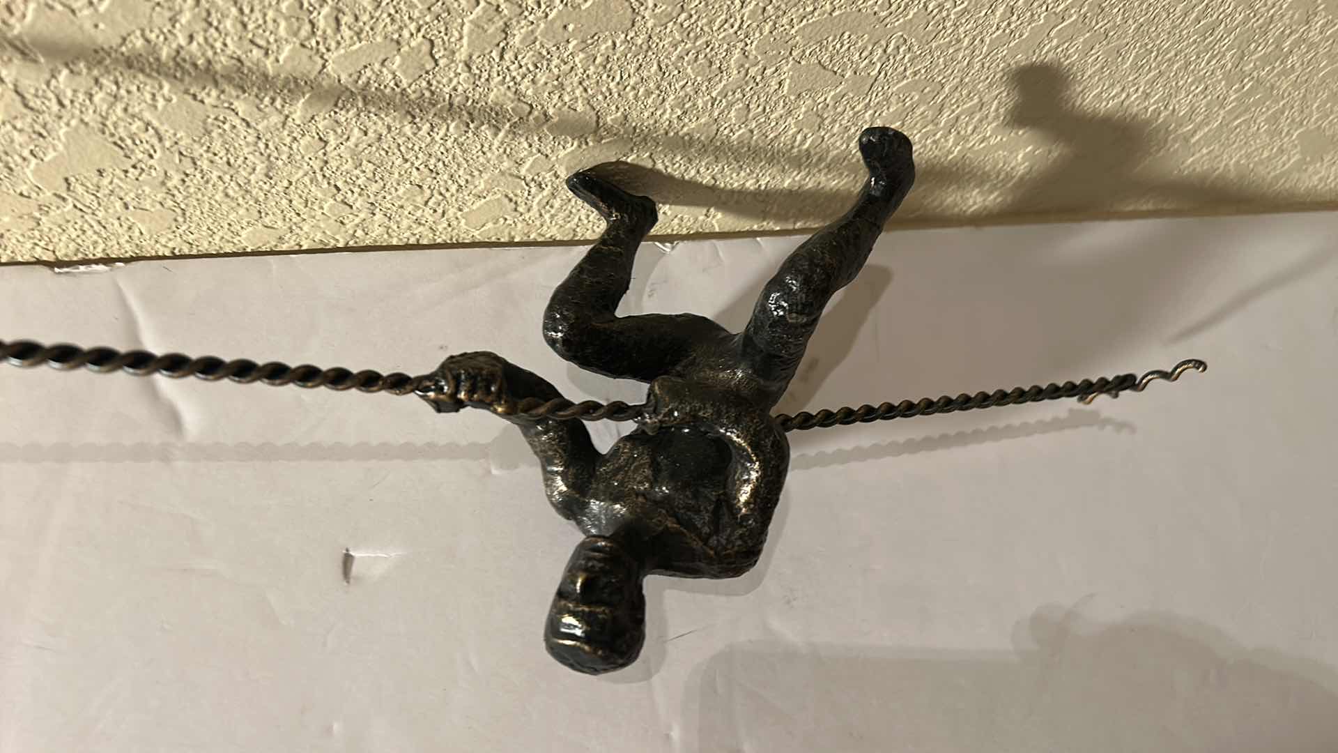 Photo 1 of 42” METAL WALL SCULPTURE “CLIMBING MAN”