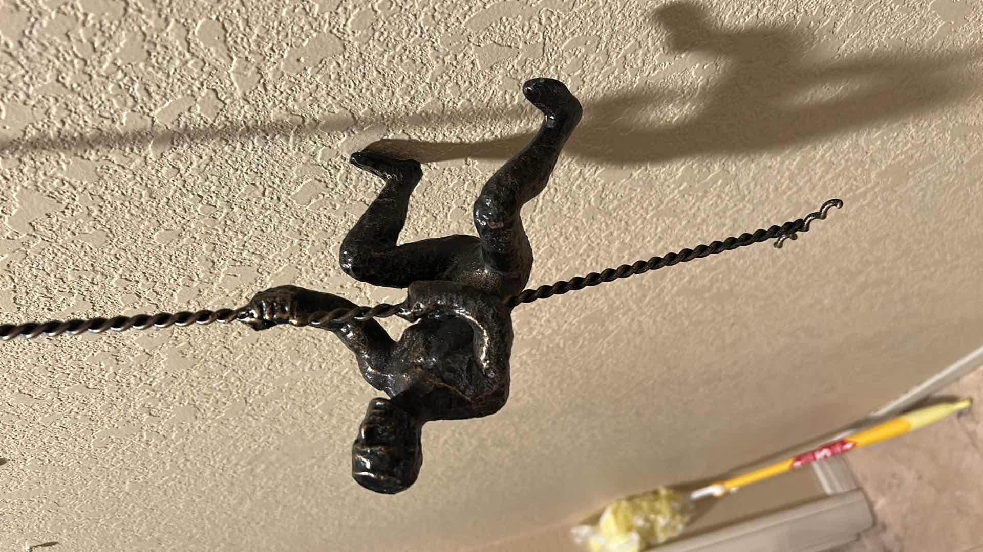 Photo 1 of 42” METAL WALL SCULPTURE “CLIMBING MAN”