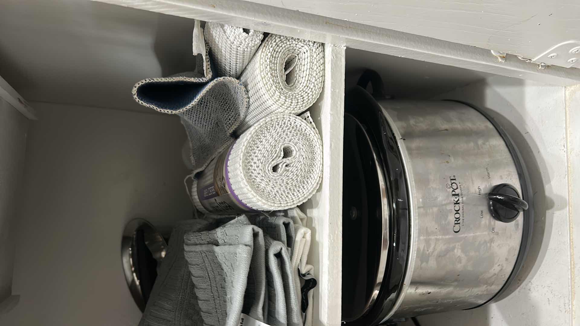 Photo 1 of CONTENTS IN KITCHEN CABINET- POTS AND PANS, CROCKPOT AND MORE