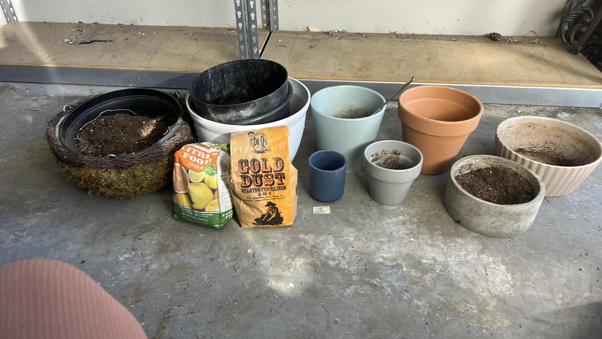 Photo 1 of GARDENING SUPPLIES- POTS AND FERTILIZER