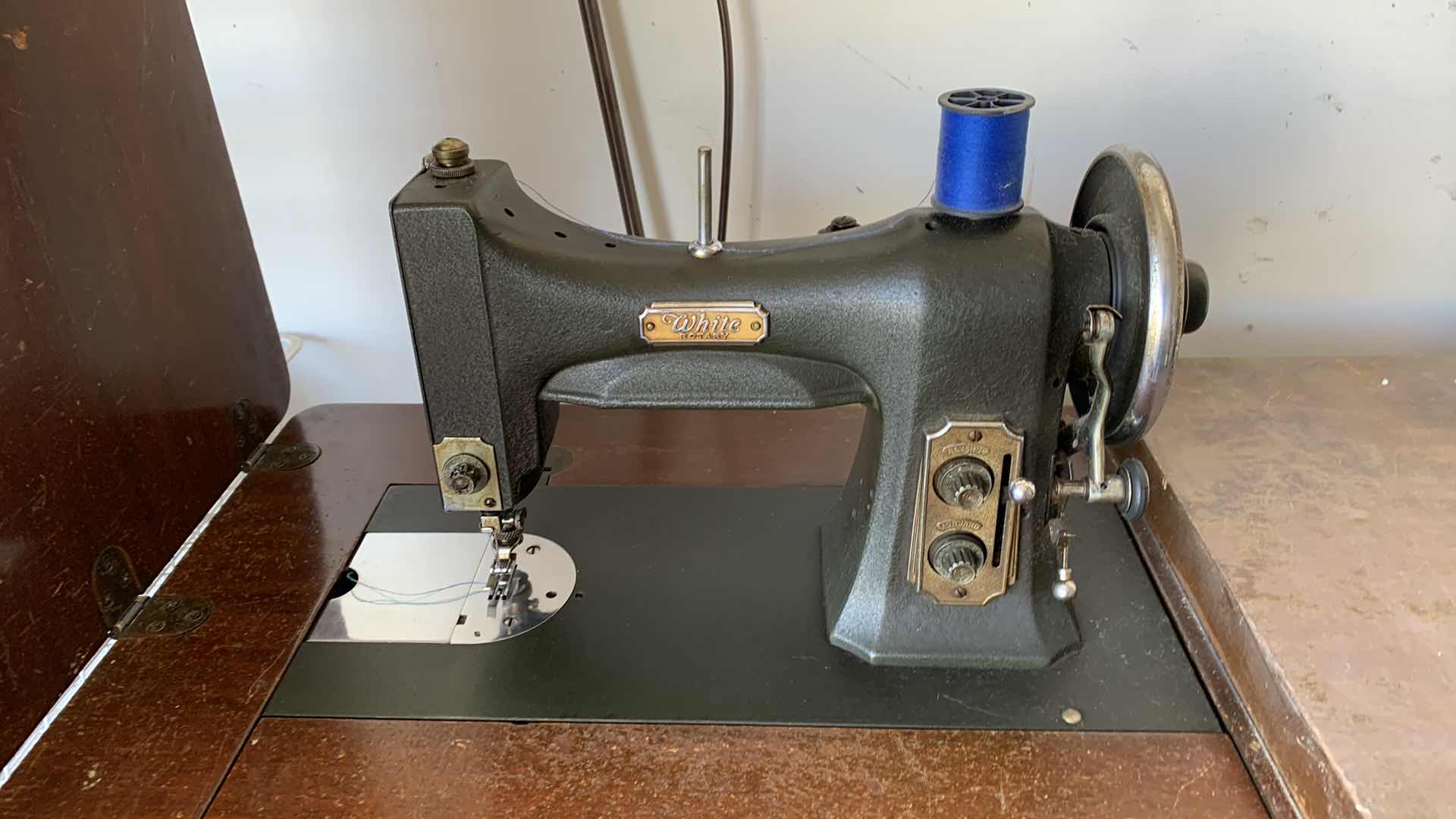 View 3 of VINTAGE WHITE ROTARY SEWING MACHINE HOUSED IN A WOODEN CABINET WITH ATTACHED LIGHT 30” X 19” H 31”