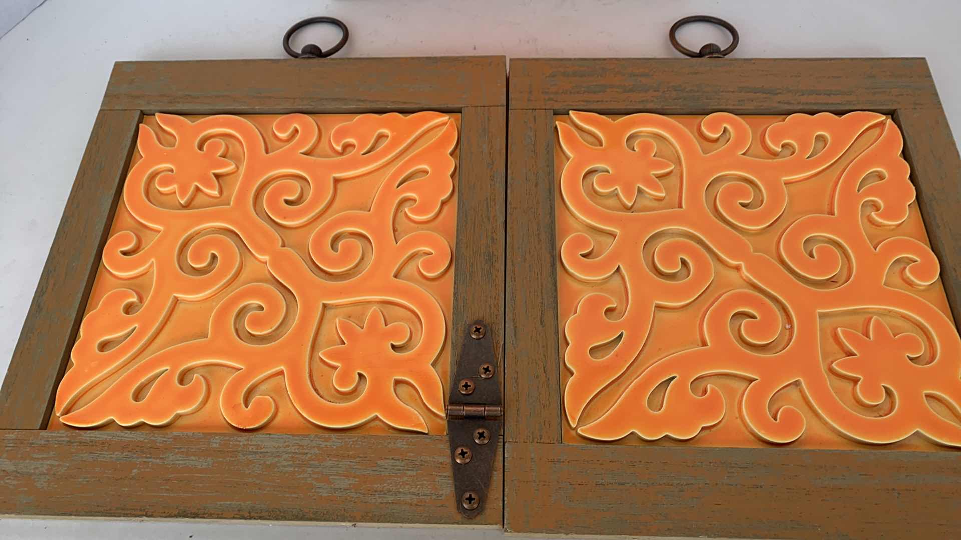 Photo 1 of 3- DECORATIVE ORANGE WALL DECOR
10” X 11”