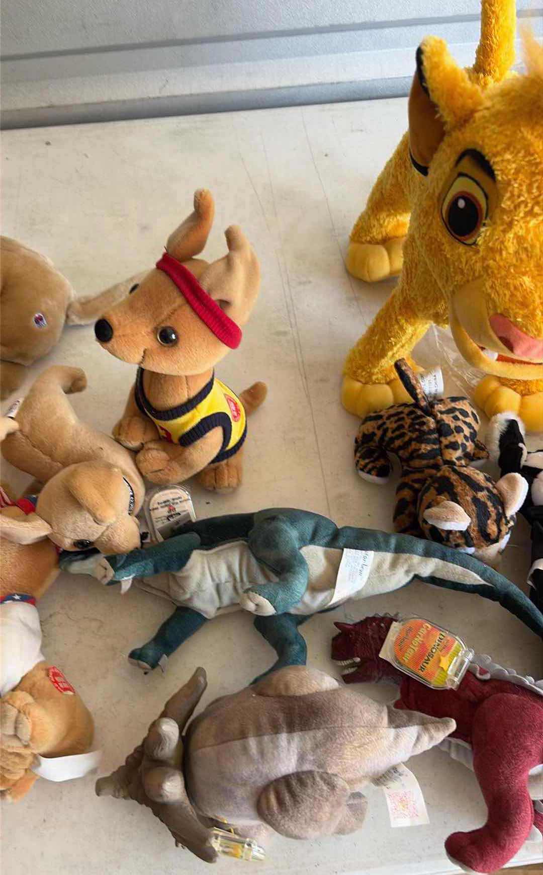 Photo 1 of CONTENTS OF BOX STUFFED ANIMALS/ DISNEY TACO BELL