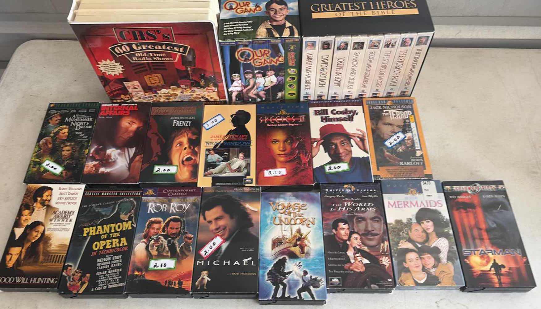 Photo 1 of CONTENTS OF BOX, VHS TAPES