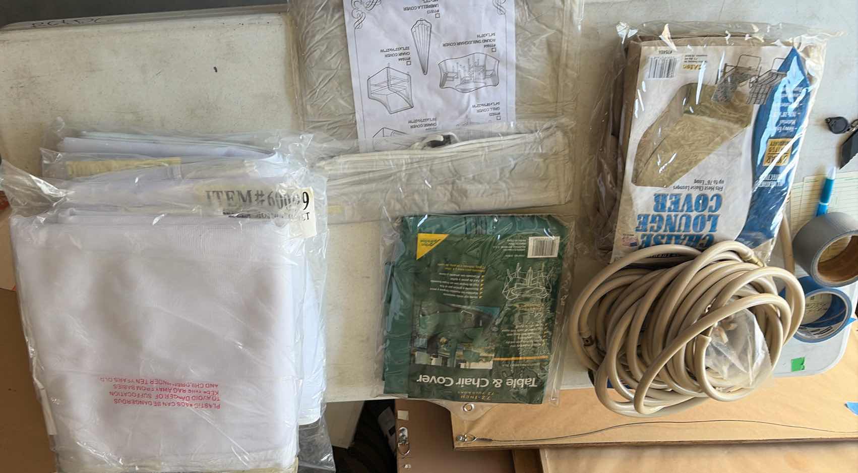 Photo 1 of CONTENTS OF BOX OUTDOOR NETTING, CHAIR COVERS, MIST HOSES