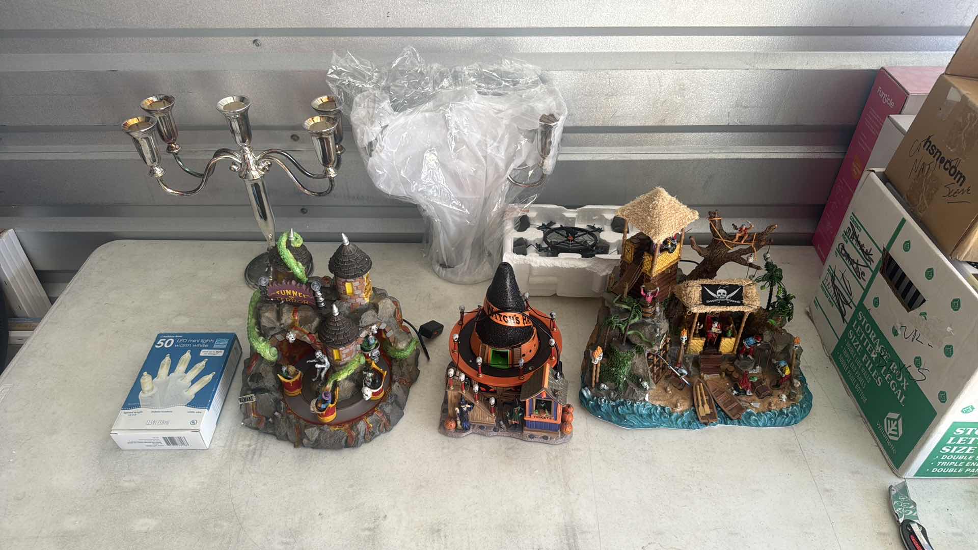 Photo 1 of CONTENTS OF BOX- HALLOWEEN SPOOKY TOWN/SILVER PLATED CANDELABRAS/LIGHTS