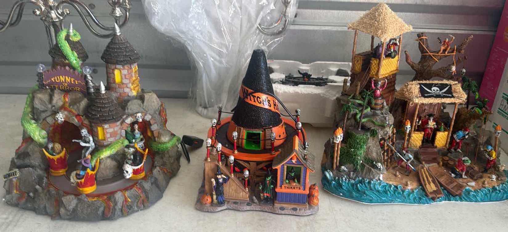 Photo 1 of CONTENTS OF BOX- HALLOWEEN SPOOKY TOWN/SILVER PLATED CANDELABRAS/LIGHTS