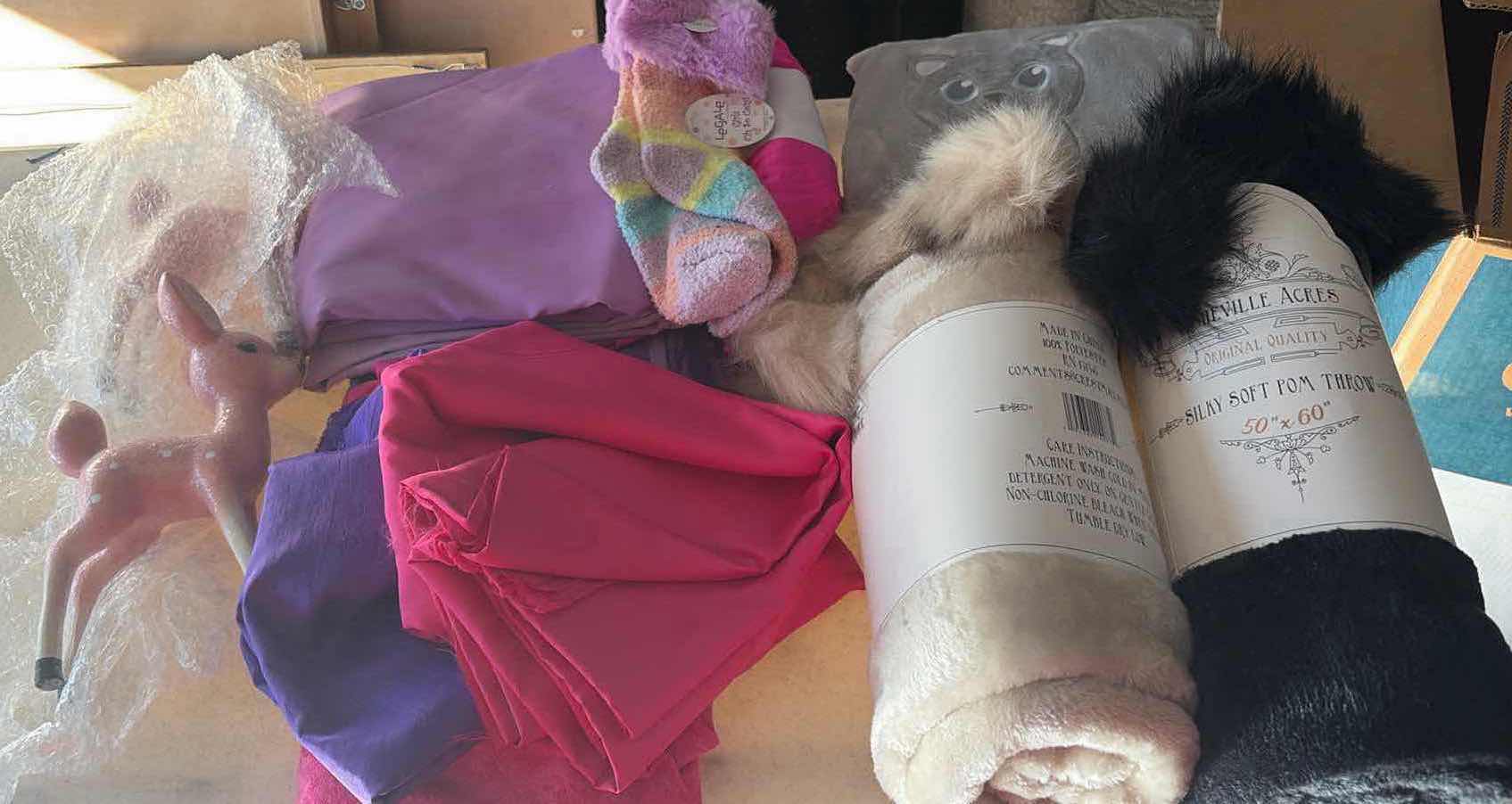 Photo 1 of CONTENTS OF BOX FABRIC/ THROW RUGS