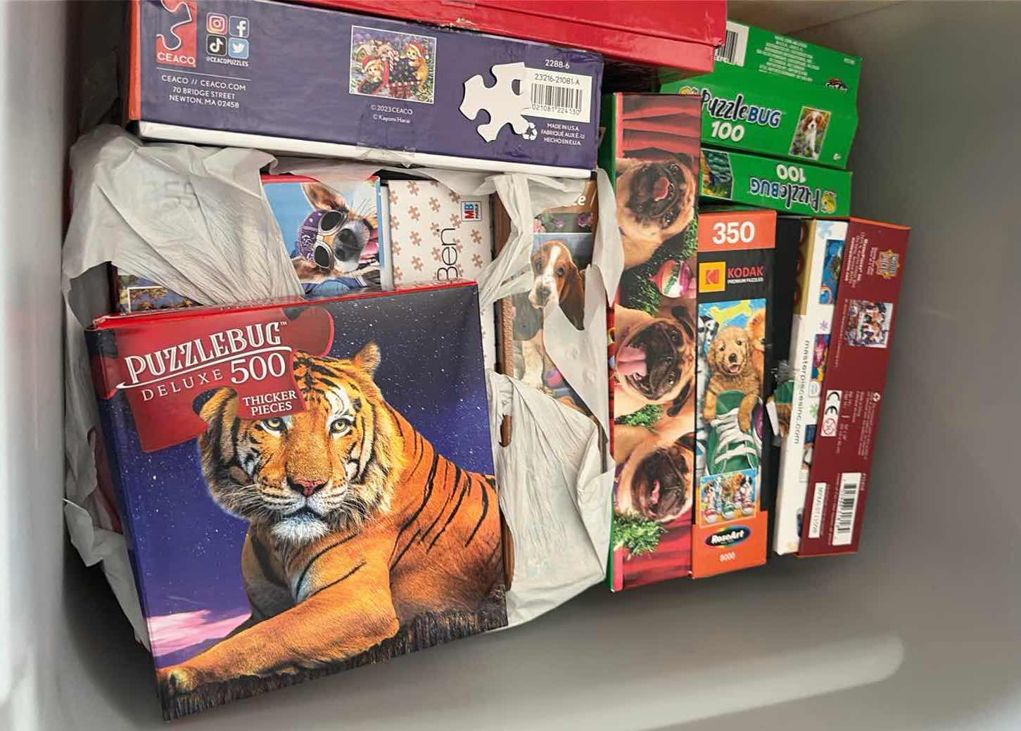 Photo 1 of CONTENTS OF BOX JIGSAW PUZZLES