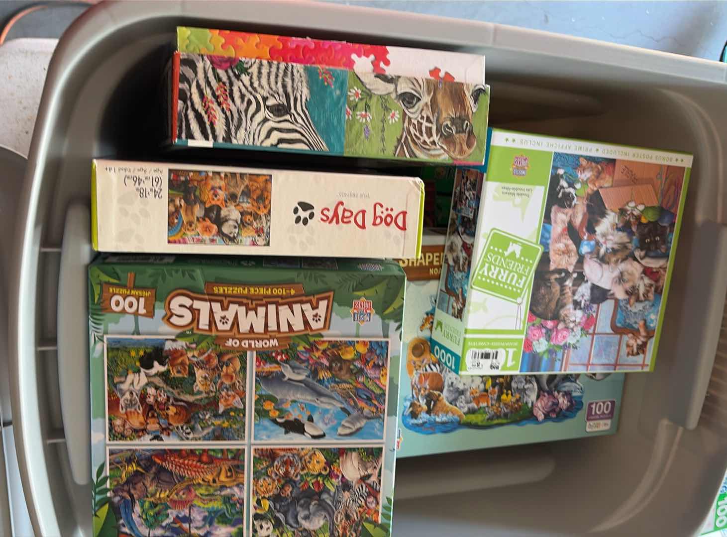 Photo 1 of CONTENTS OF BOX JIGSAW PUZZLES