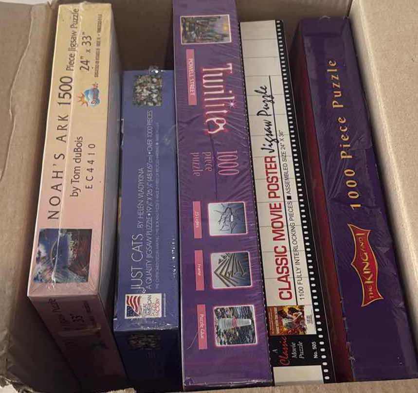 Photo 1 of CONTENTS OF BOX-PUZZLES