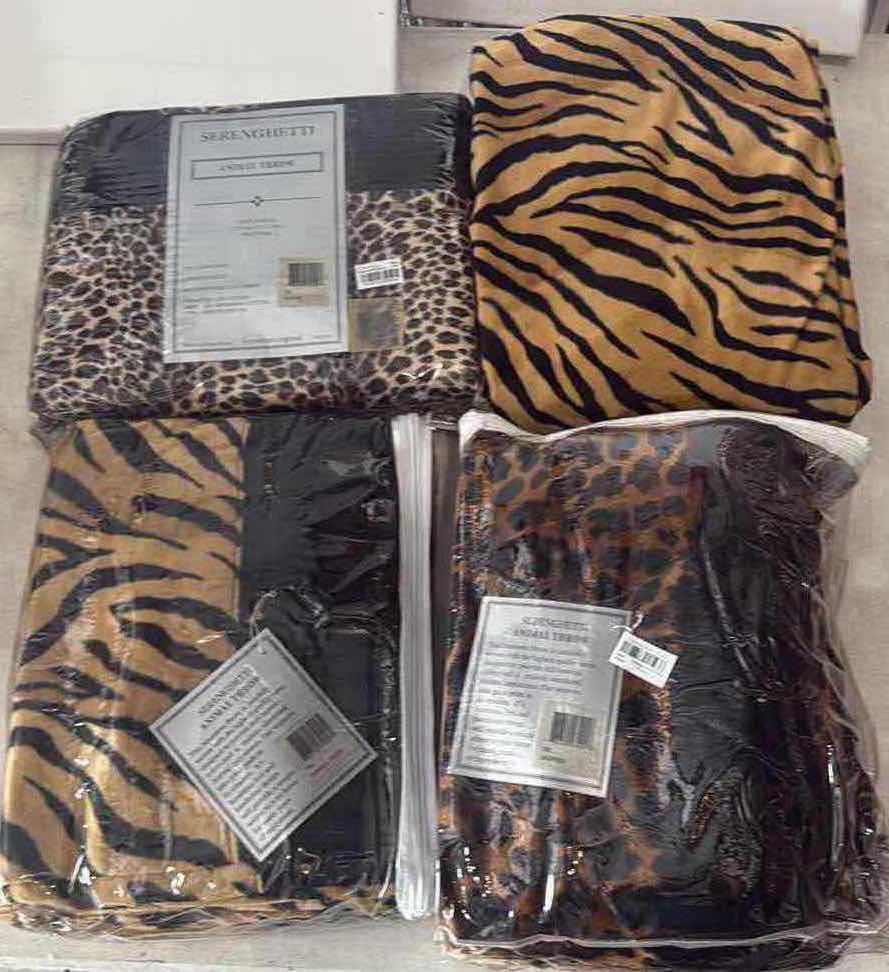 Photo 1 of CONTENTS OF BOX- 4 SERENGETI BLANKETS