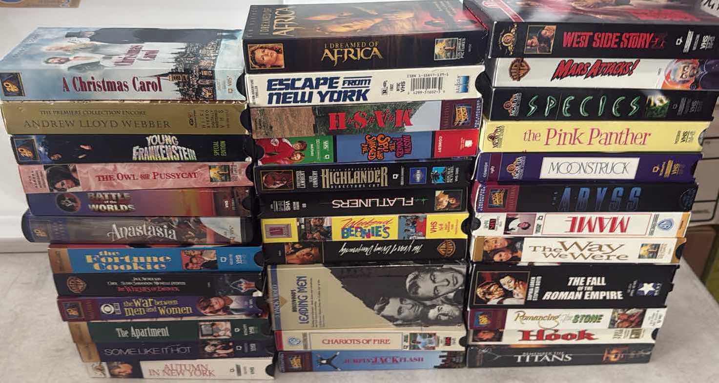 Photo 1 of CONTENTS OF BOX-VHS TAPES