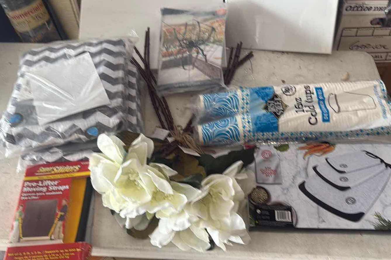 Photo 1 of CONTENTS OF TOTE-FLOWERS/FURNITURE PROTECTORS/CUTTING BOARDS