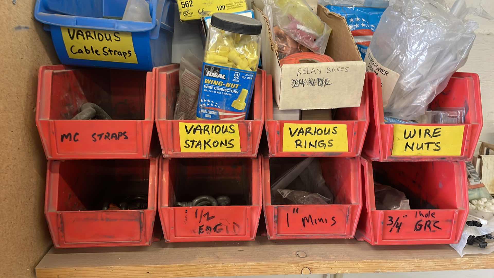 Photo 1 of CONTENT OF SHELF WIRE NUTS WIRE CONNECTORS ZIP TIES SHACKLES STORAGE BINS