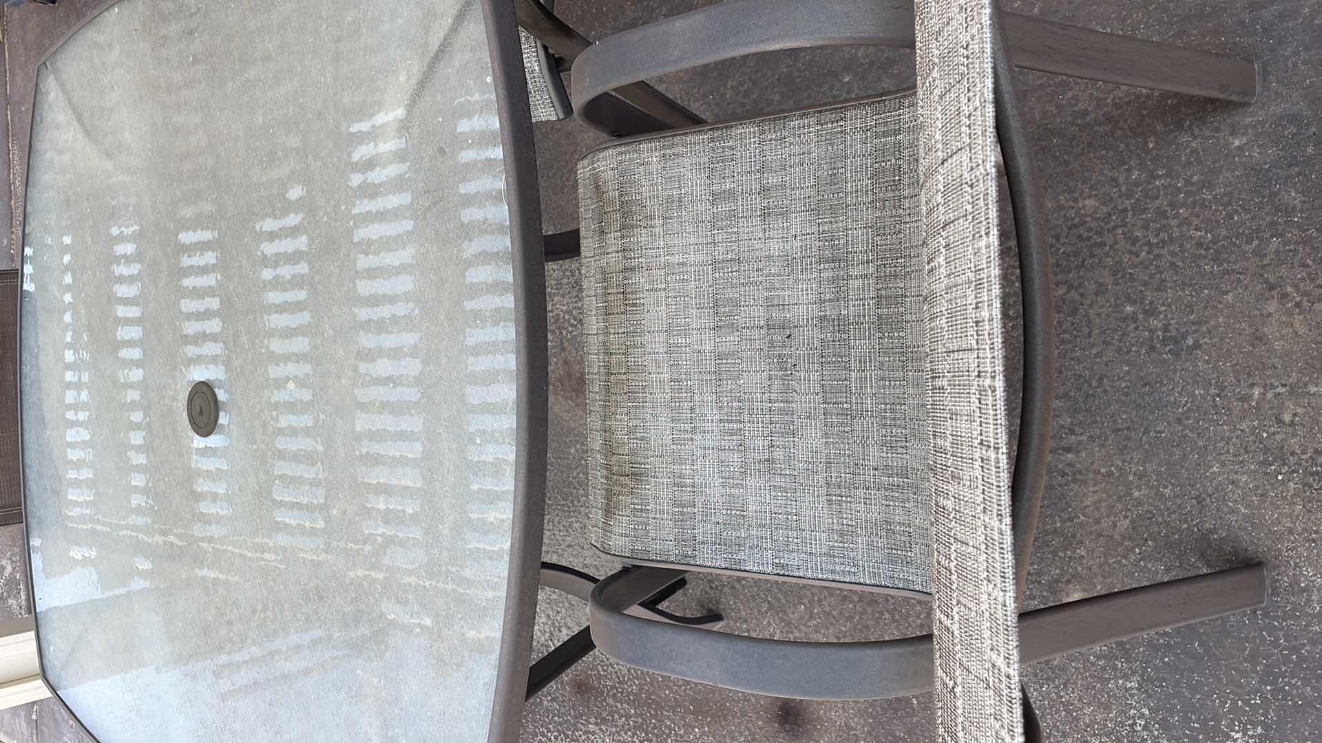 Photo 1 of PATIO TABLE 45” AND 4 CHAIRS