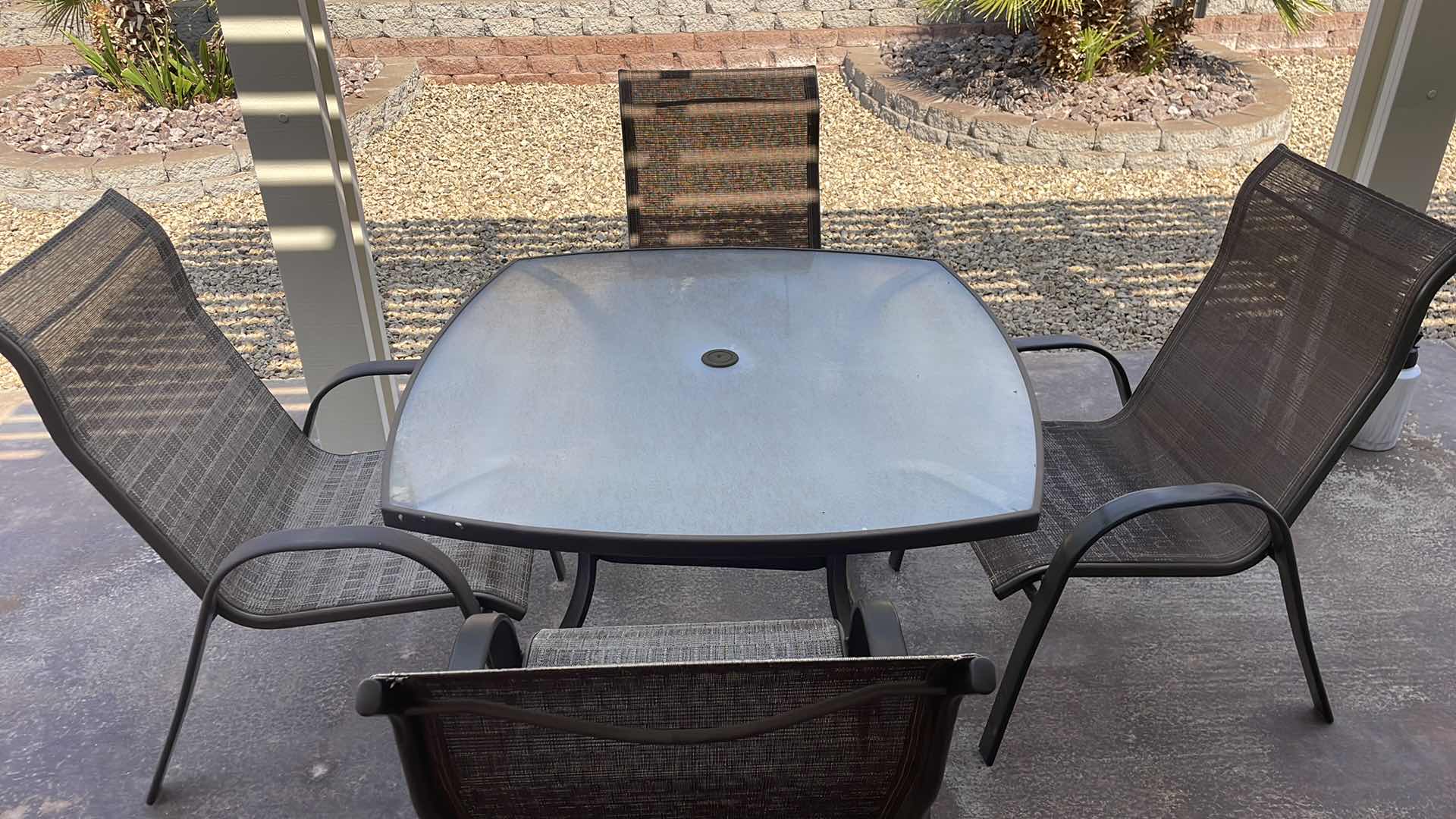 Photo 1 of PATIO TABLE 45” AND 4 CHAIRS