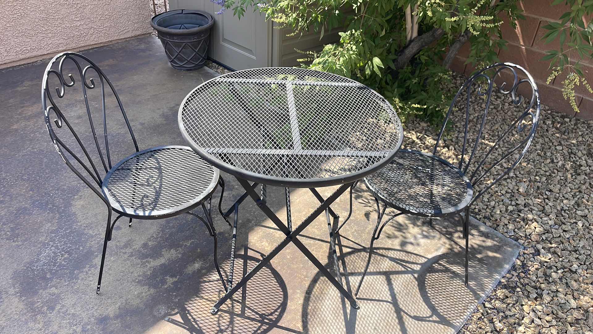 Photo 1 of WROUGH IRON TABLE 28” AND CHAIRS