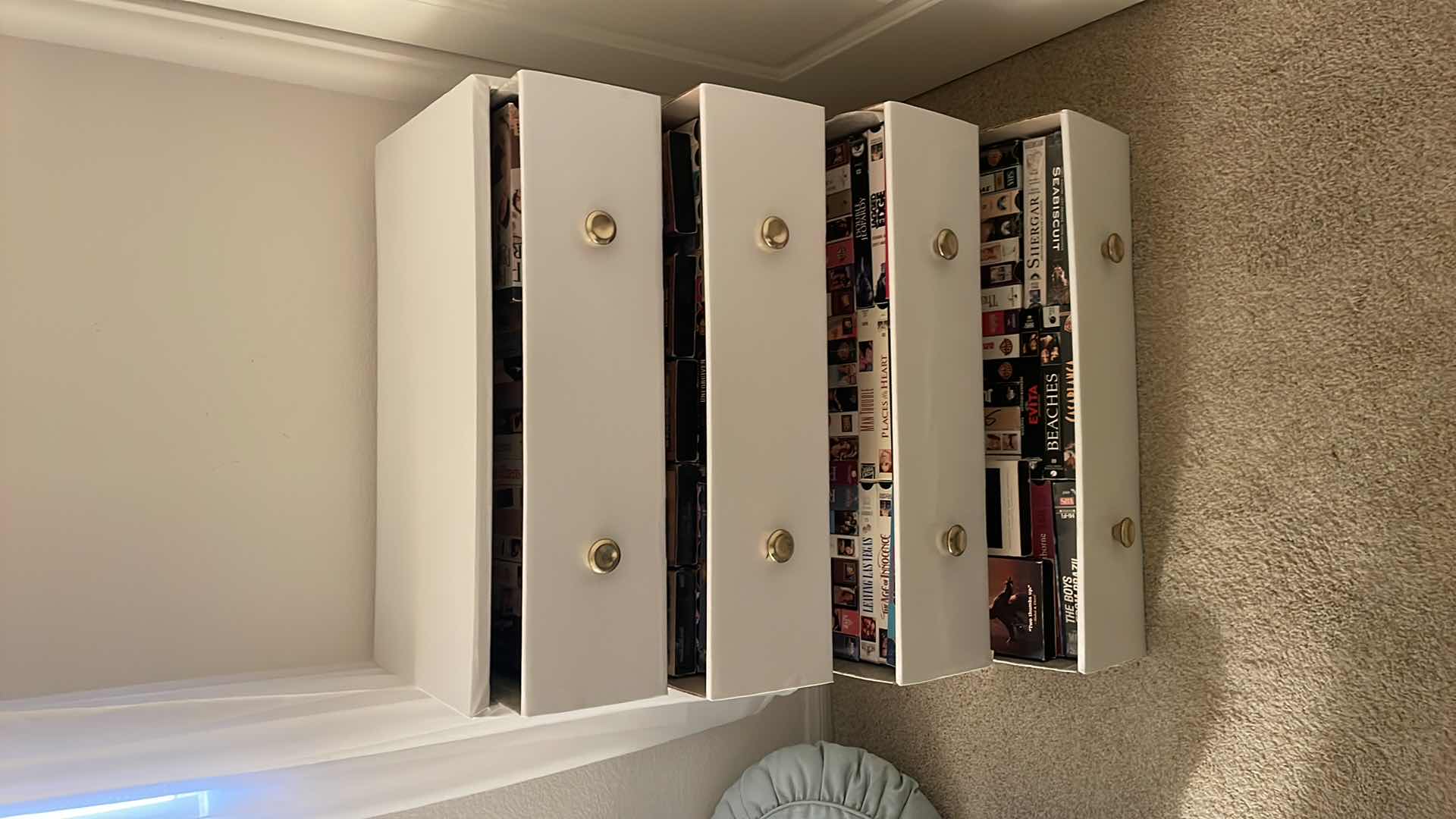 Photo 1 of CARDBOARD DRESSER FULL OF VHS SEE PICTURES 24”x12”x28”