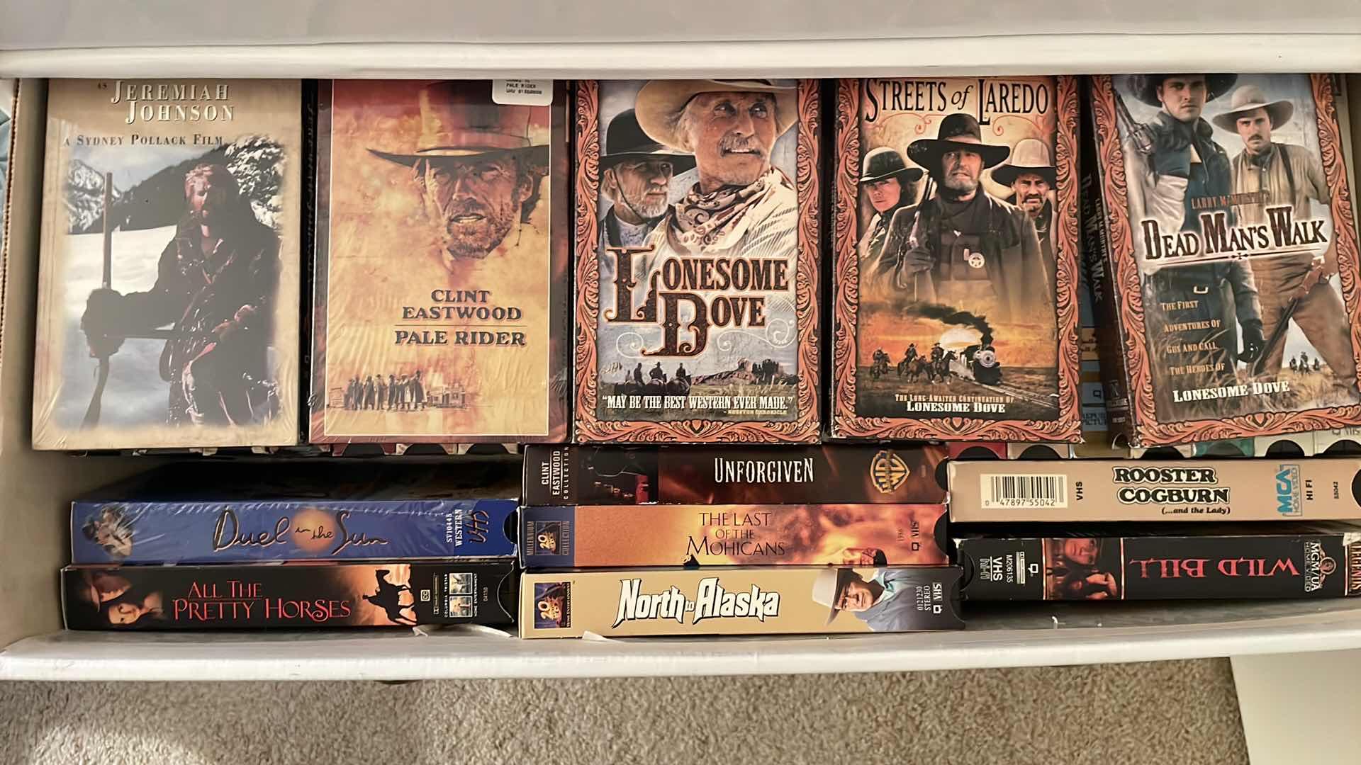 Photo 1 of CARDBOARD DRESSER FULL OF VHS SEE PICTURES 24”x12”x28”