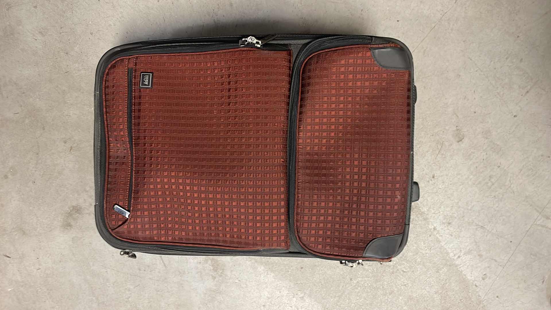 Photo 1 of REI CARRY ON SUIT CASE WITH 2 SMALLER MATCHING BAGS.