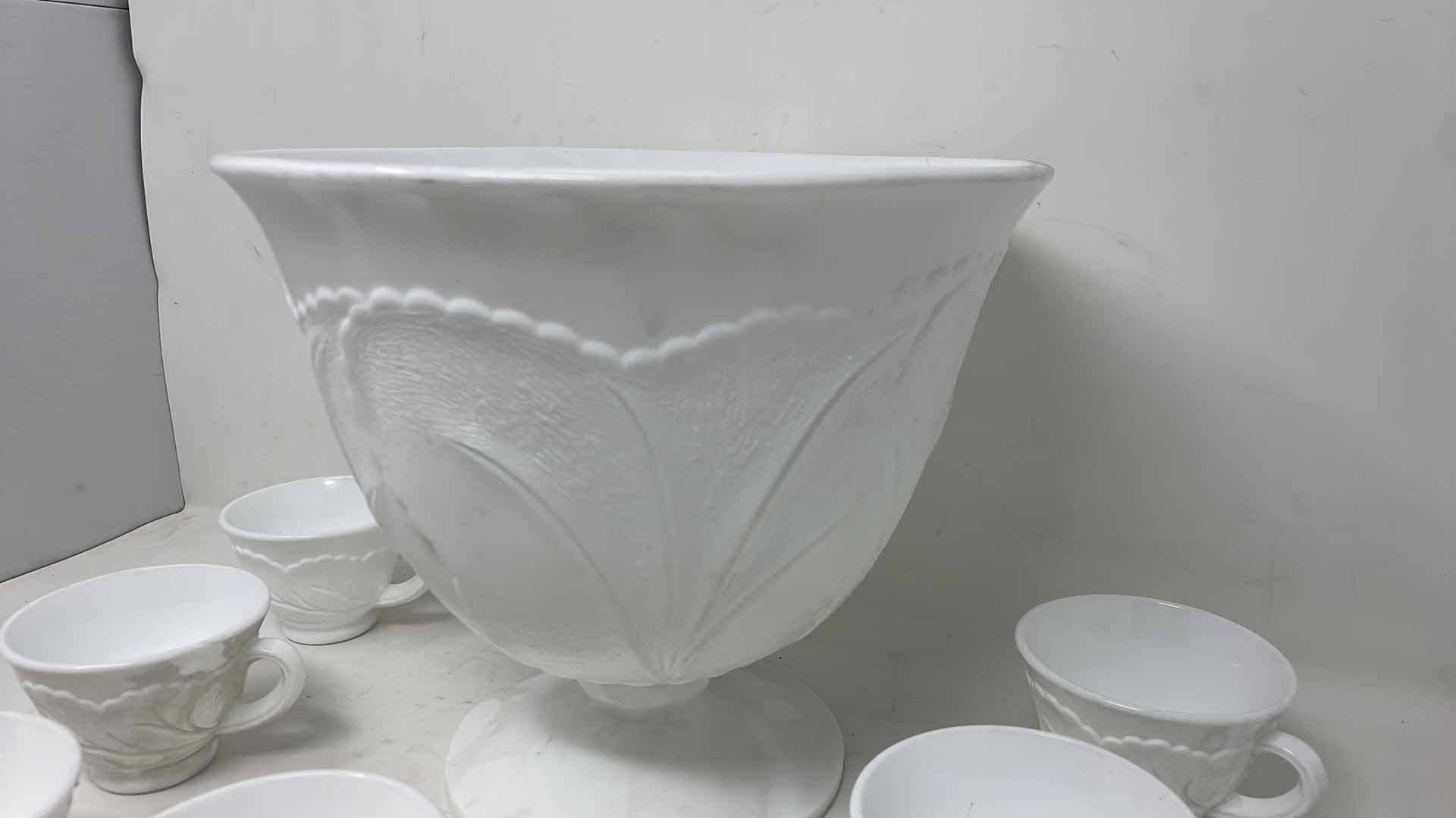 Photo 1 of INDIANA GLASS PEBBLE LEAF DESIGN MILK GLASS  PUNCH BOWL AND 11 CUPS 10" X 10"