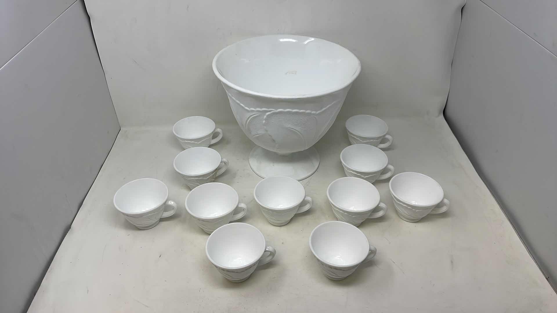 Photo 1 of INDIANA GLASS PEBBLE LEAF DESIGN MILK GLASS  PUNCH BOWL AND 11 CUPS 10" X 10"