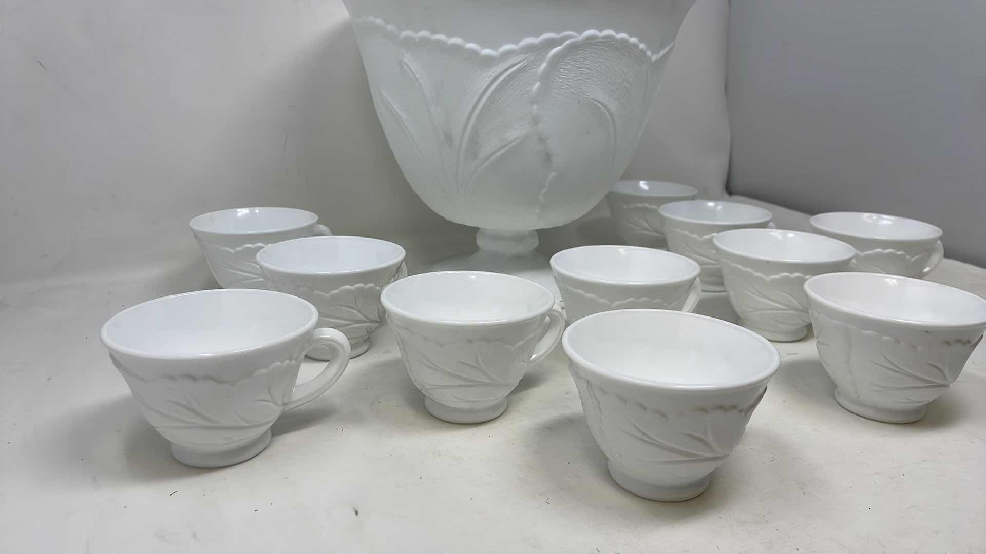 Photo 1 of INDIANA GLASS PEBBLE LEAF DESIGN MILK GLASS  PUNCH BOWL AND 11 CUPS 10" X 10"