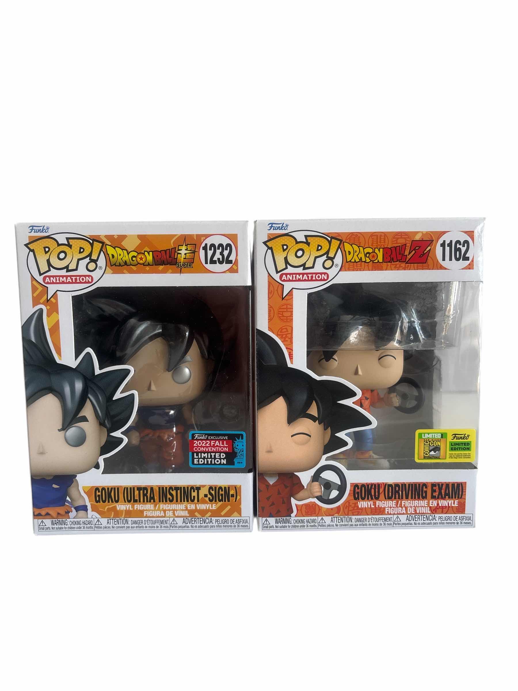Photo 1 of (2) PCS NIB FUNKO POP GOKU (ULTRA INSTINCT- SIGN-) LIM. ED. & GOKU (DRIVING EXAM) LIM ED. DRAGONBALL Z
