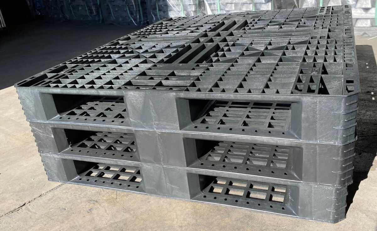 Photo 1 of STACKABLE PLASTIC PALLETS DIFFERENT TYPES 40” X 48”