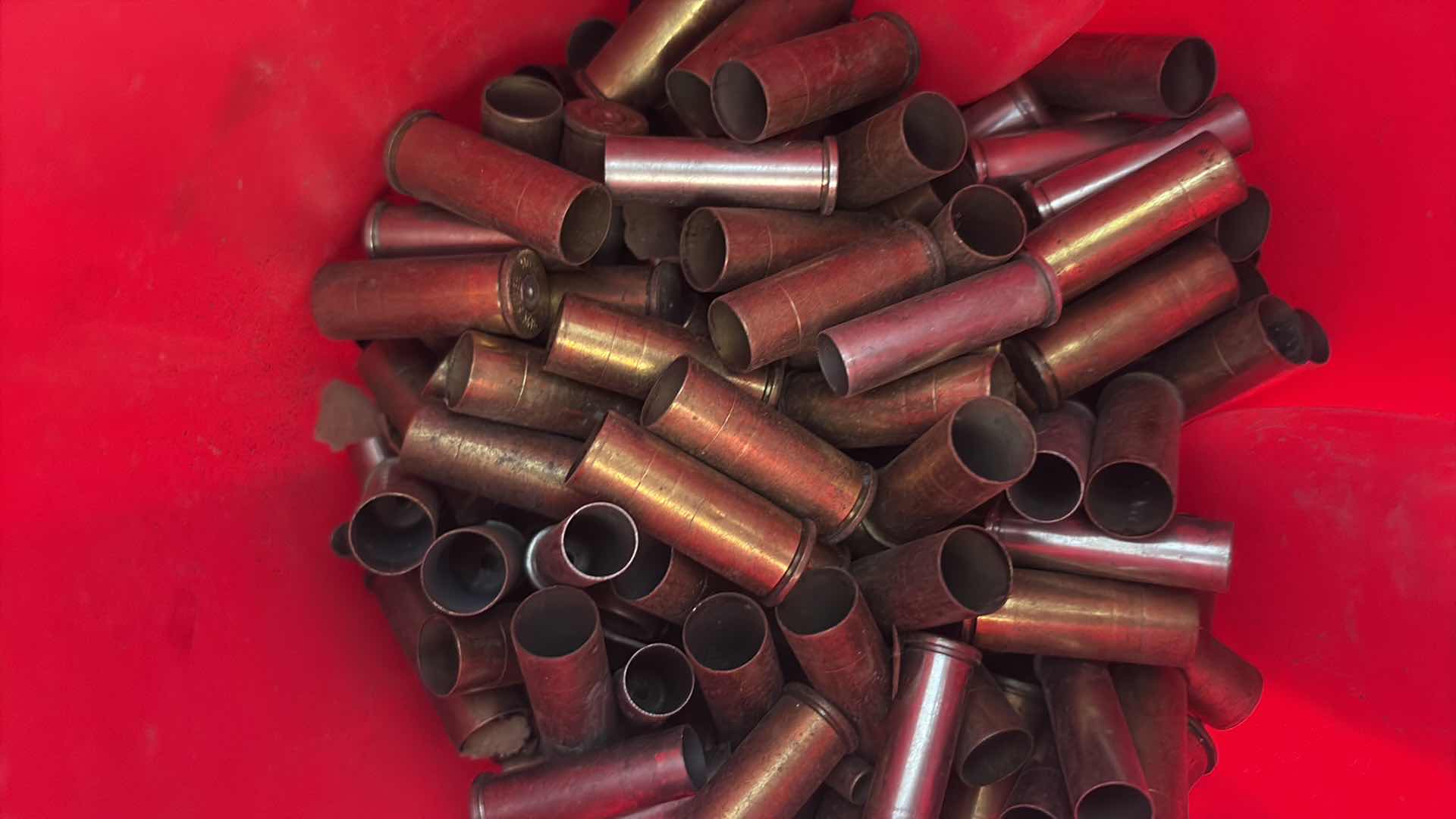 Photo 1 of CONTENTS OF CONTAINER BRASS SHELL CASING VARIOUS CALIBERS