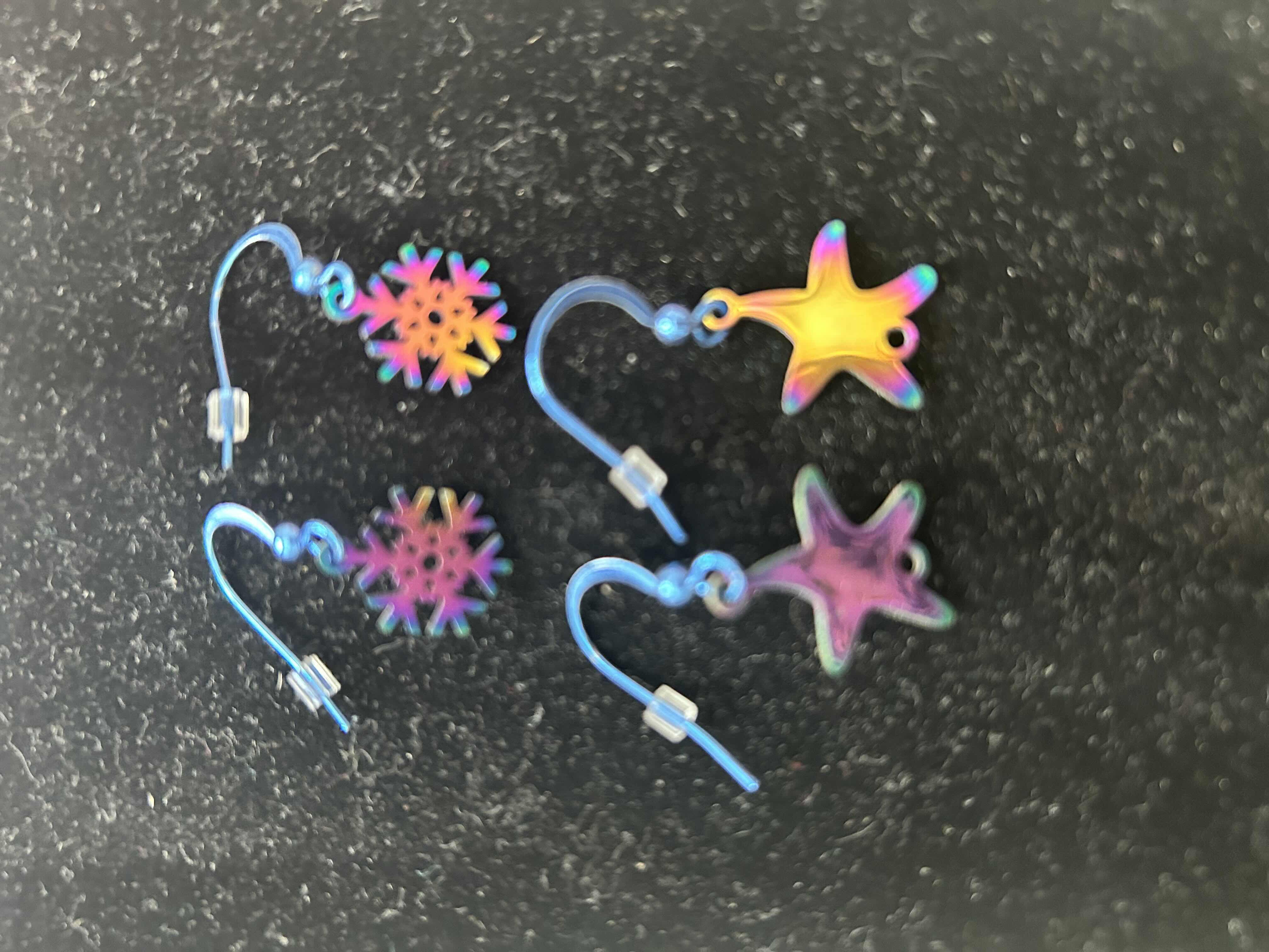 Photo 1 of 2- IRIDESCENT STAR SNOWFLAKE EARRINGS
