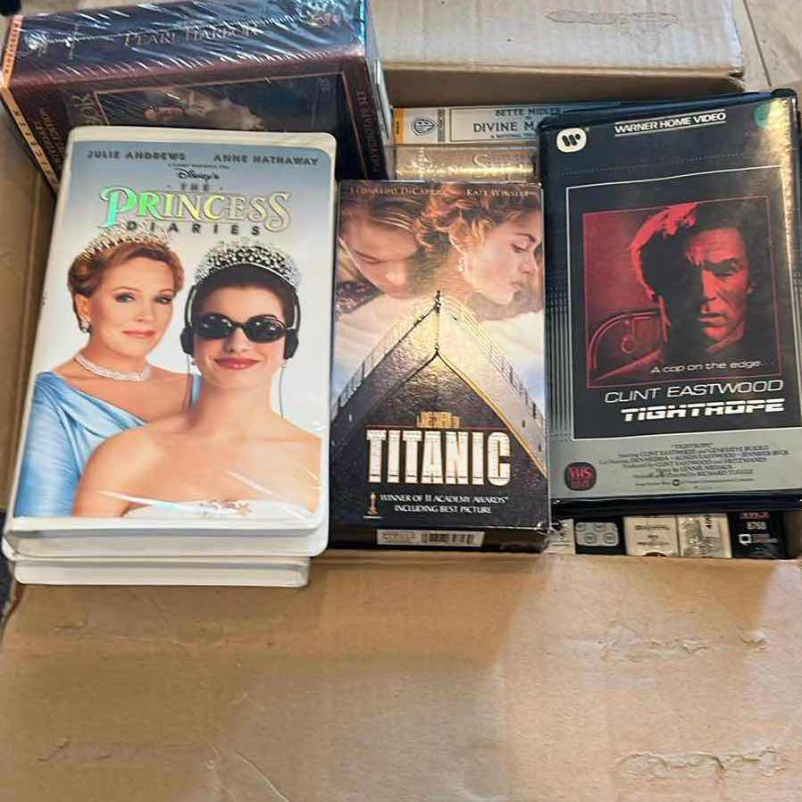 Photo 1 of CONTENTS OF BOX ASSORTED VHS SHELF SOLD SEPARATELY