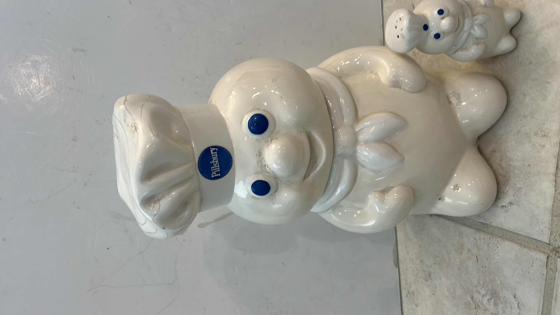 Photo 1 of PILLSBURY DOUGHBOY COOKIE JAR AND SALT SHAKER