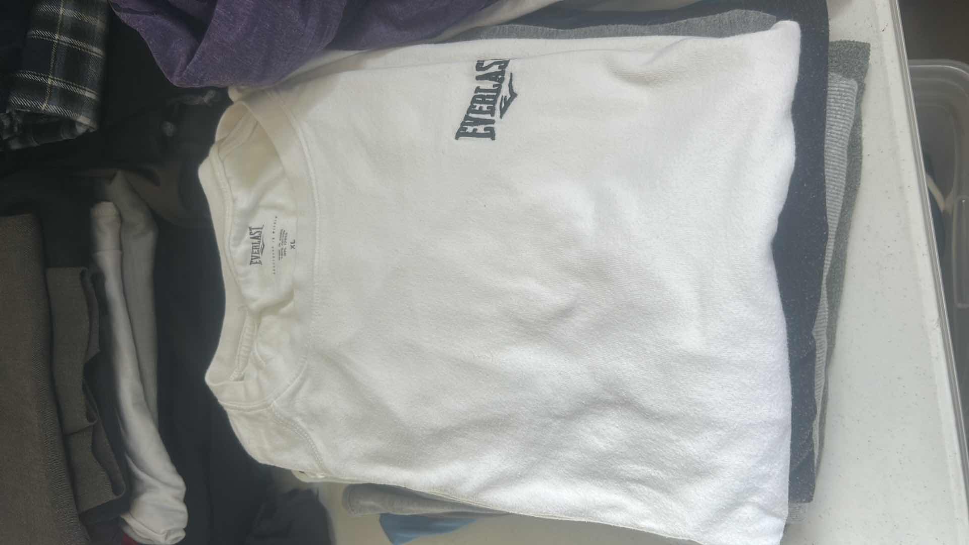 Photo 1 of MENS & WOMENS  TOPS MOSTLY SIZE LARGE