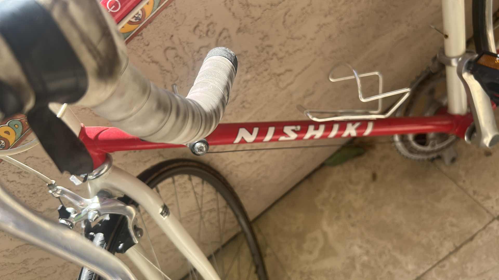 Photo 1 of VINTAGE NISHIKI OLYMPIC ROAD BICYCLE TIRES FLAT
