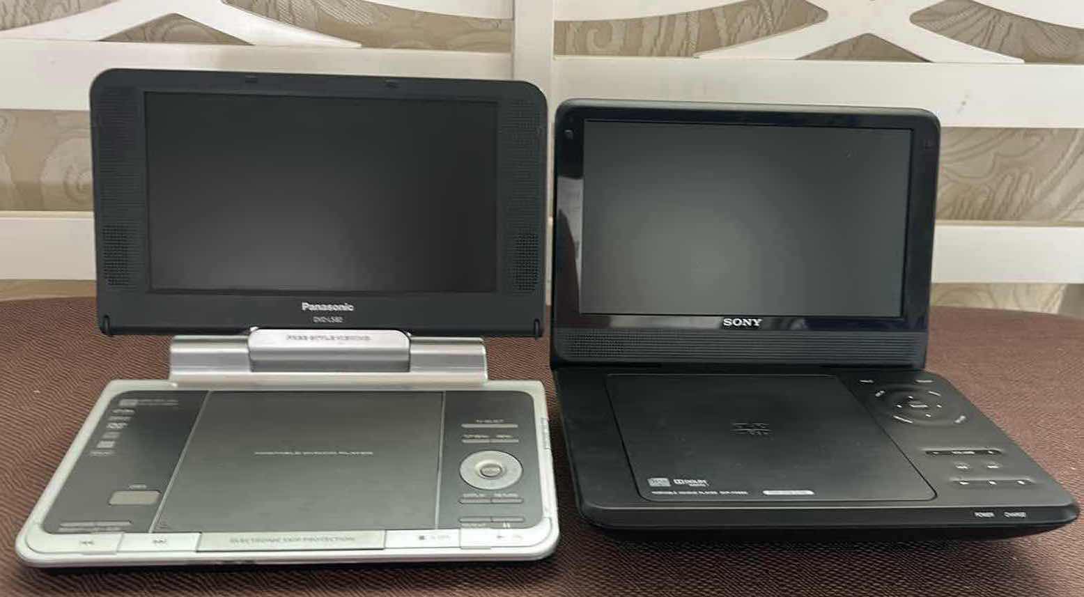 Photo 1 of PANASONIC PORTABLE DVD PLAYER AND SONY PORTABLE DVD PLAYER