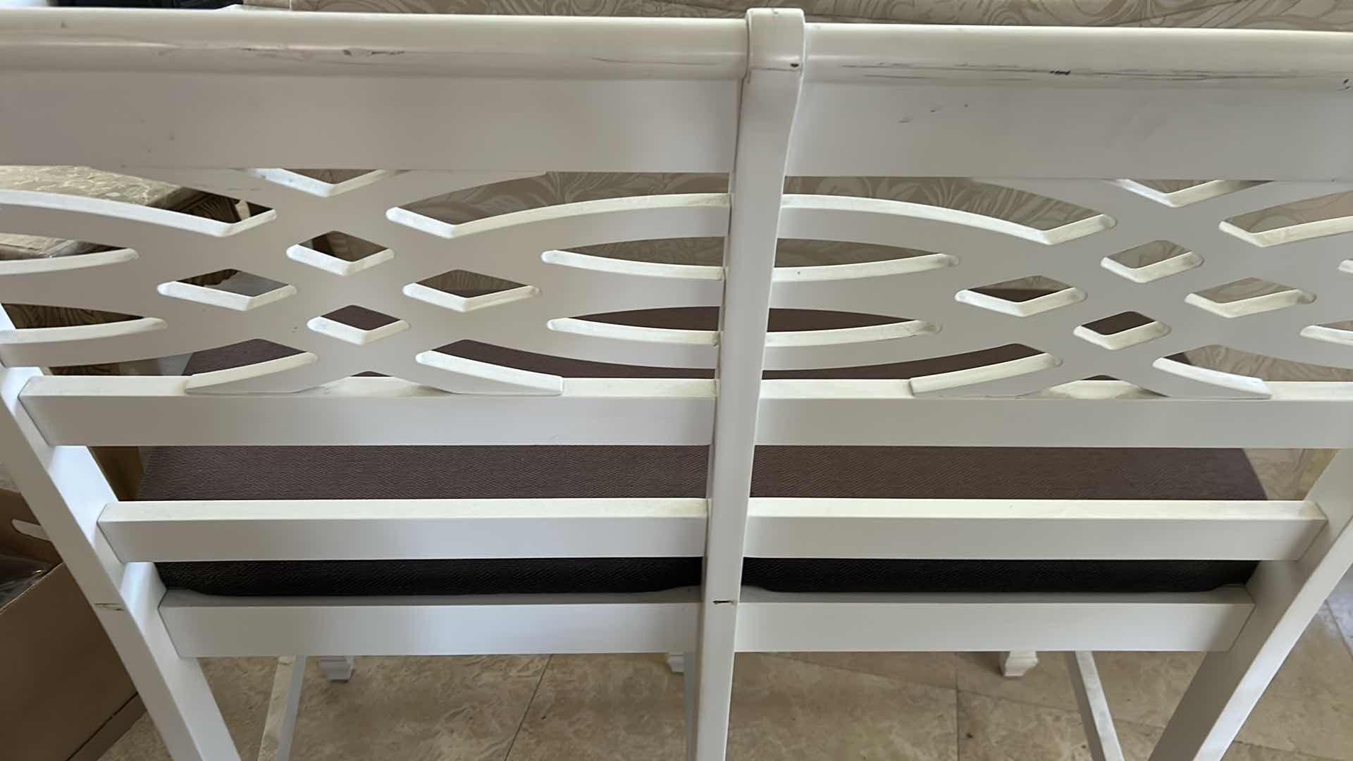 Photo 1 of WHITE WOOD DINING BENCH W DARK BROWN UPHOLSTERED CUSHION LATICE STYLE BACKREST 42" X 41"