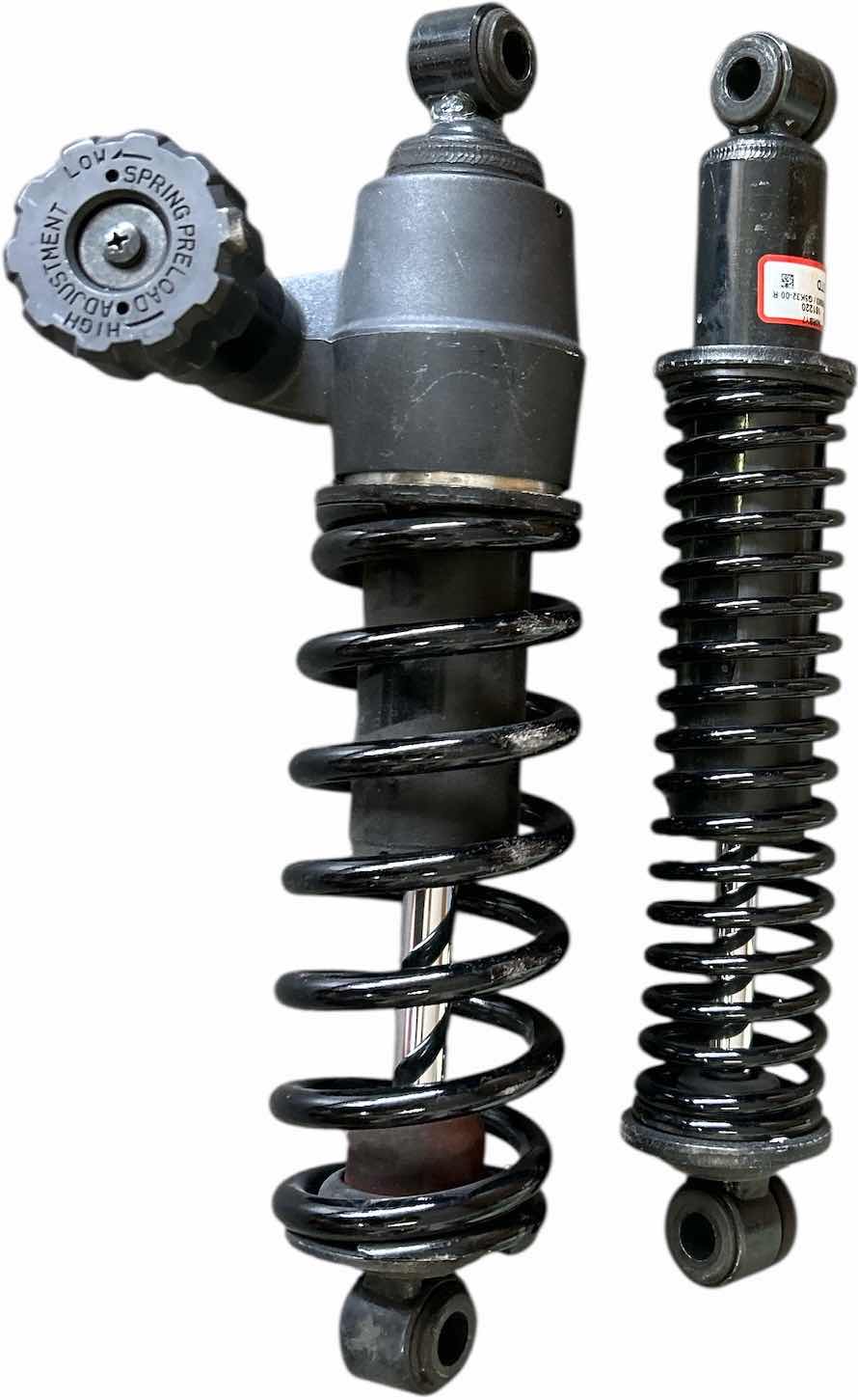 Photo 1 of 2 MOTORCYCLE REAR SHOCKS LIKELY HARLEY DAVIDSON GIVEN THE TEXT, "GPRELO OSPRING STMENT"