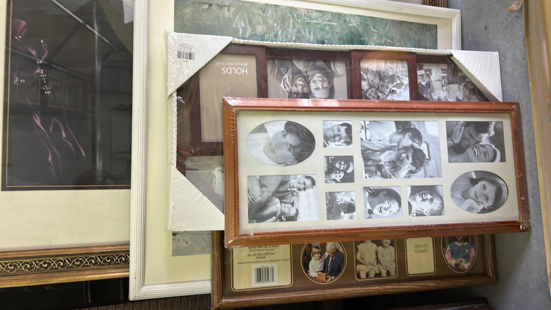 Photo 1 of STACK OF ARTWORK AND FRAMES ( LARGEST 27 x H37.5”)