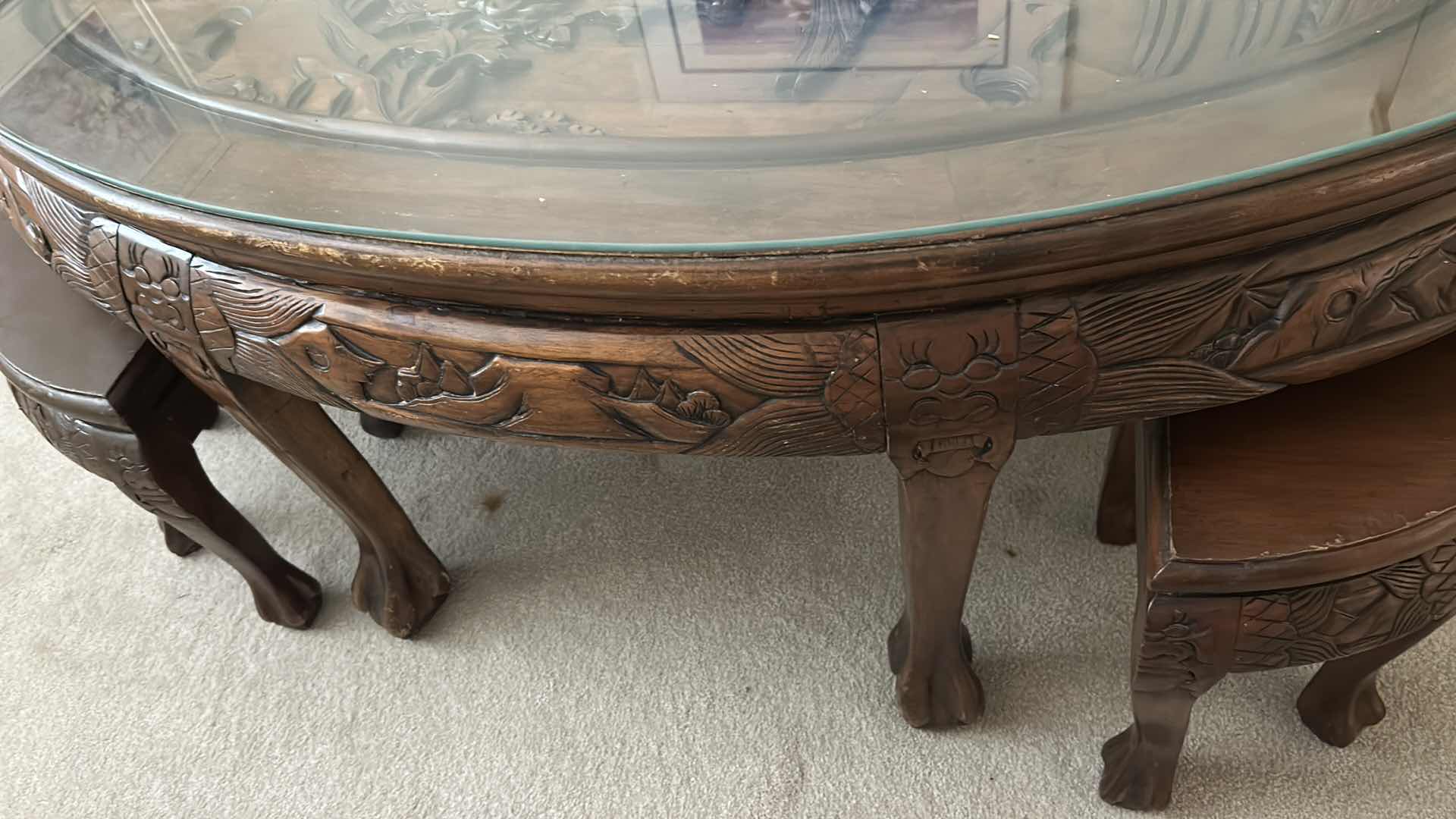 Photo 1 of ROSEWOOD CHINESE CARVED TEA TABLE W NESTING STOOLS AND GLASS TOP 47" X 29" H 22" 