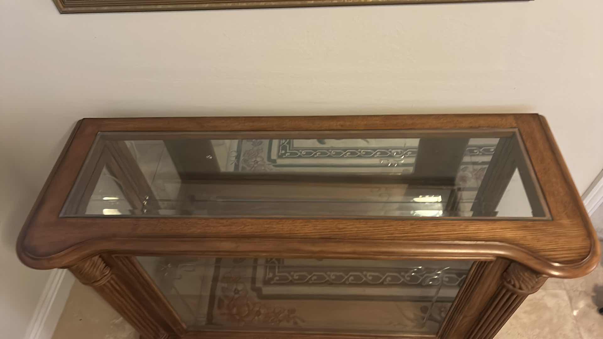 Photo 1 of WOOD WITH BEVELED GLASS  CURIO CABINET 52” x 19” x H34 1/2”