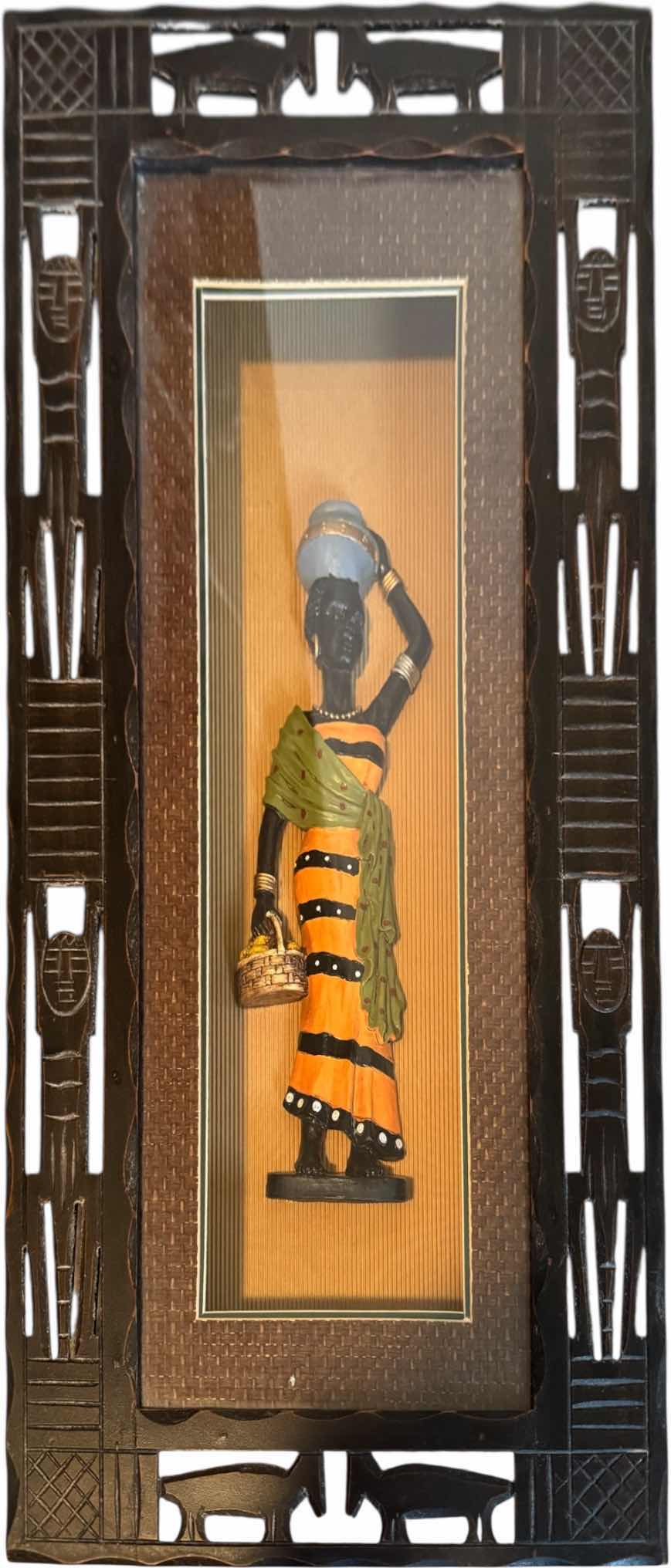 Photo 1 of 3- VINTAGE WOODEN FRAMED AFRICAN ARTWORK

W12” X L24”
AND SMALLER