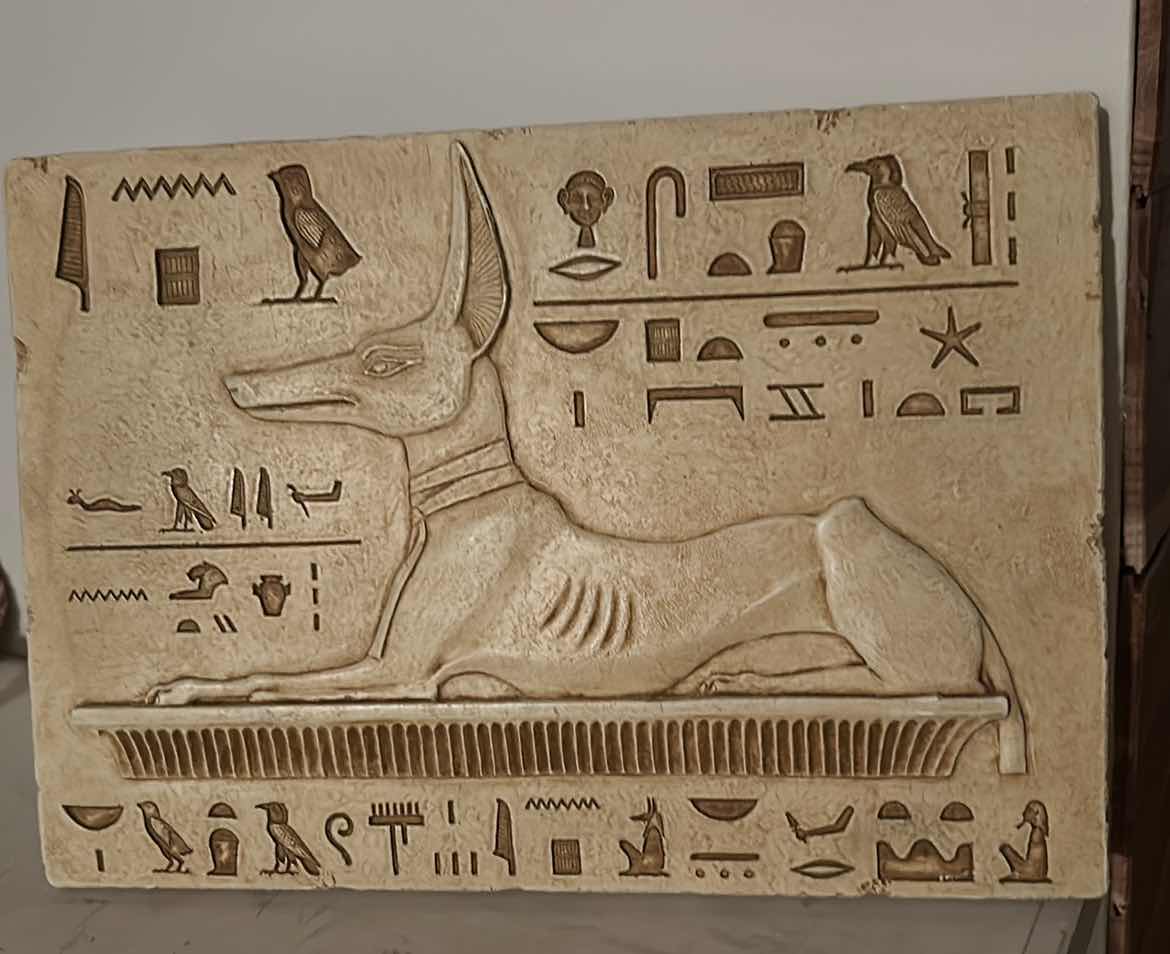 Photo 1 of PLASTER WALL SCULPTURE OF ANUBIS, THE EGYPTIAN GOD ASSOCIATED WITH MUMMIFICATION AND AFTERLIFE . 103/4” x H7.25”