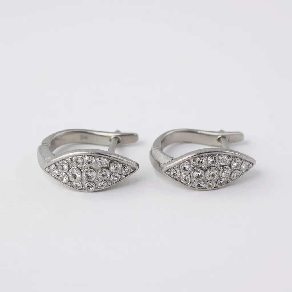 Photo 1 of 18K WHITE GOLD PAIR W 0.50 ctw OF DIAMOND EARRINGS TTL GRAMS 3.40 W INSURANCE APPRAISAL ITEM # 2017
