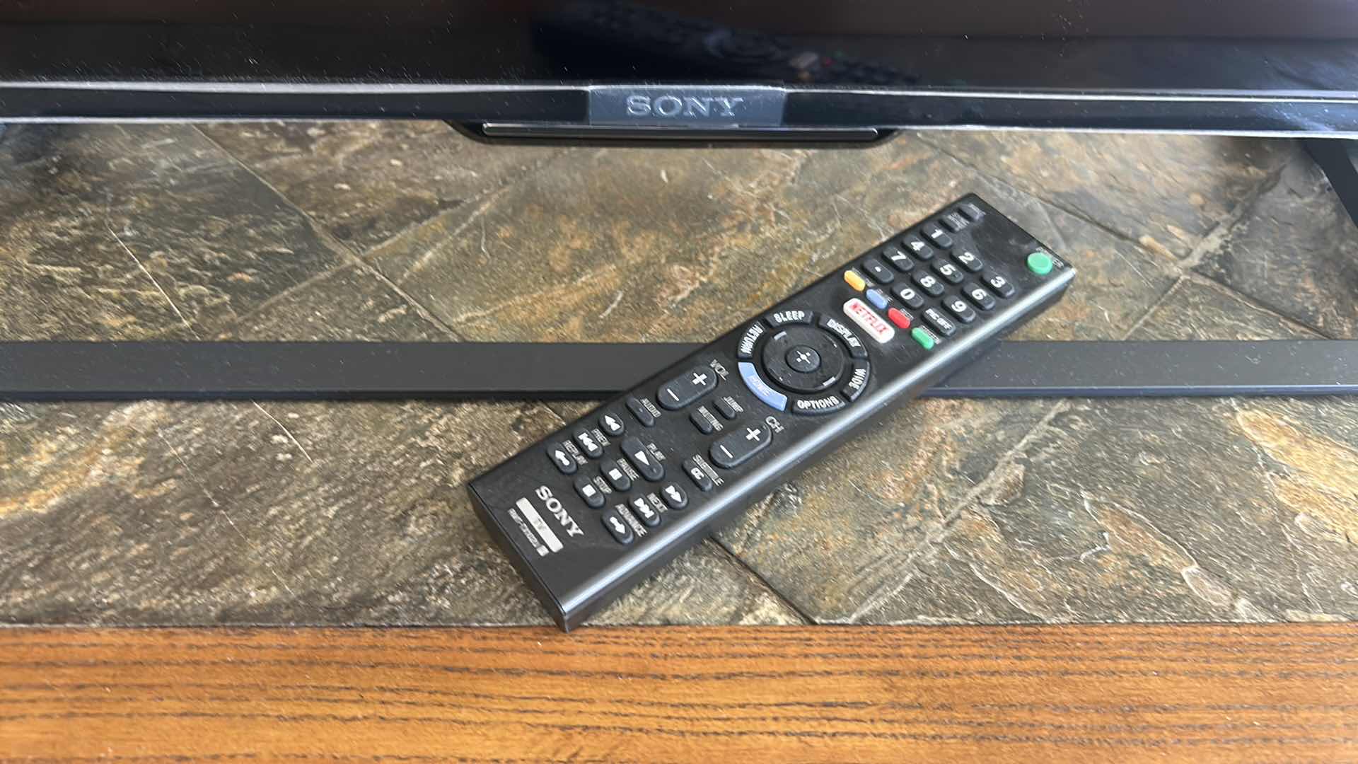 Photo 1 of SONY BRAVIA 49" TV ON STAND W REMOTE